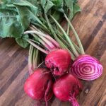 Chioggia beets, red and white marbled interior beets with greens