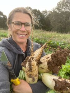 Your farmer Josephine with the first harvest of Korean half long type diakons