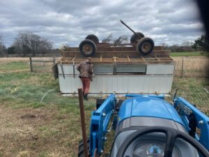 Upside down chicken coop. In early March we had winds near 60 MPH blow this chicken coop over