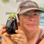 Josephine posing with googly eyed eggplant. Thanks Stephanie for this picture