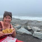 Josephine enjoying fried clams from the Lobster Shack