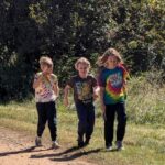 Cooper, (L), Guy, (C) and Oscar, (R) on a walk around the farm