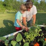 Cooper even helped plant some herbs into our tub. The tub marks the entrance to our farm. Up next a new mailbox and a sign