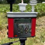 The researchers brought a portable weather station, here reporting some steamy field conditions just before lunch.