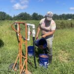Randy built a fertilizer injection system that can be hooked up to our drip irrigation.  This allows us to feed our plants after they have been growing for a while, and have used up the nutrients we applied before planting.  We have been trying out feeding the tomatoes, and we just gave the okra a shot of nitrogen, too.