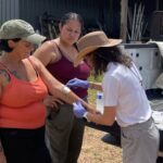 Kenzie removes the sweat collection patch from Kim's arm as part of study we participated in today.