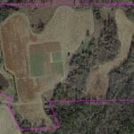 2012 Winter first year of Tubby Creek Farm. House and wash pack in NW corner veggie patch square in middle of field