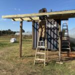 Building a lean too for a potting shed next to the green house.