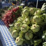 Kohlrabi and radish on display at the farmers market