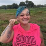 Kayla with a four leaf clover she found