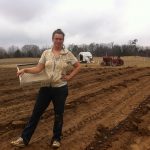 Know your farmer, here is Josephine while planting potatoes