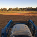 View from the tractor, prepping an area for early spring beds