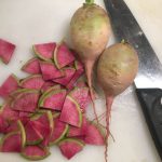 Beautiful red and green slices of watermelon radish