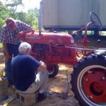 Russ and Gary working on our Farmall Cub